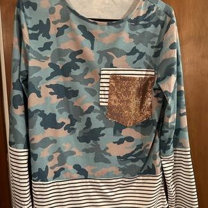 Multi pattern shirt size small